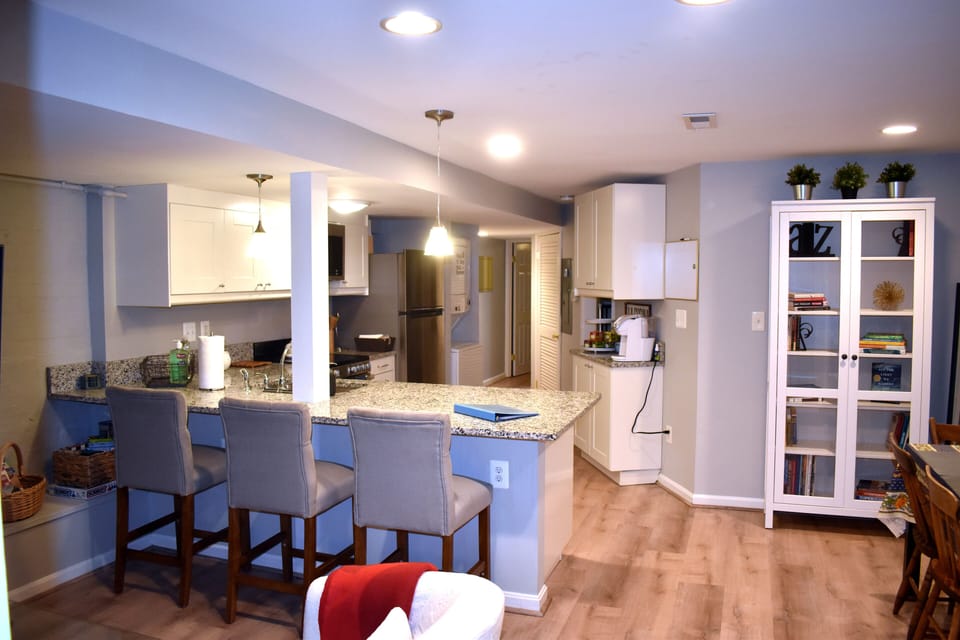View from entrance. Living area to left, kitchen straight ahead, dining to right
