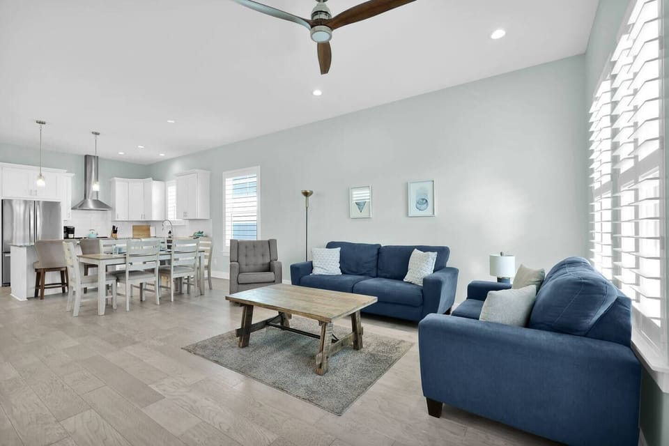 Living room easily flows into dining area. 