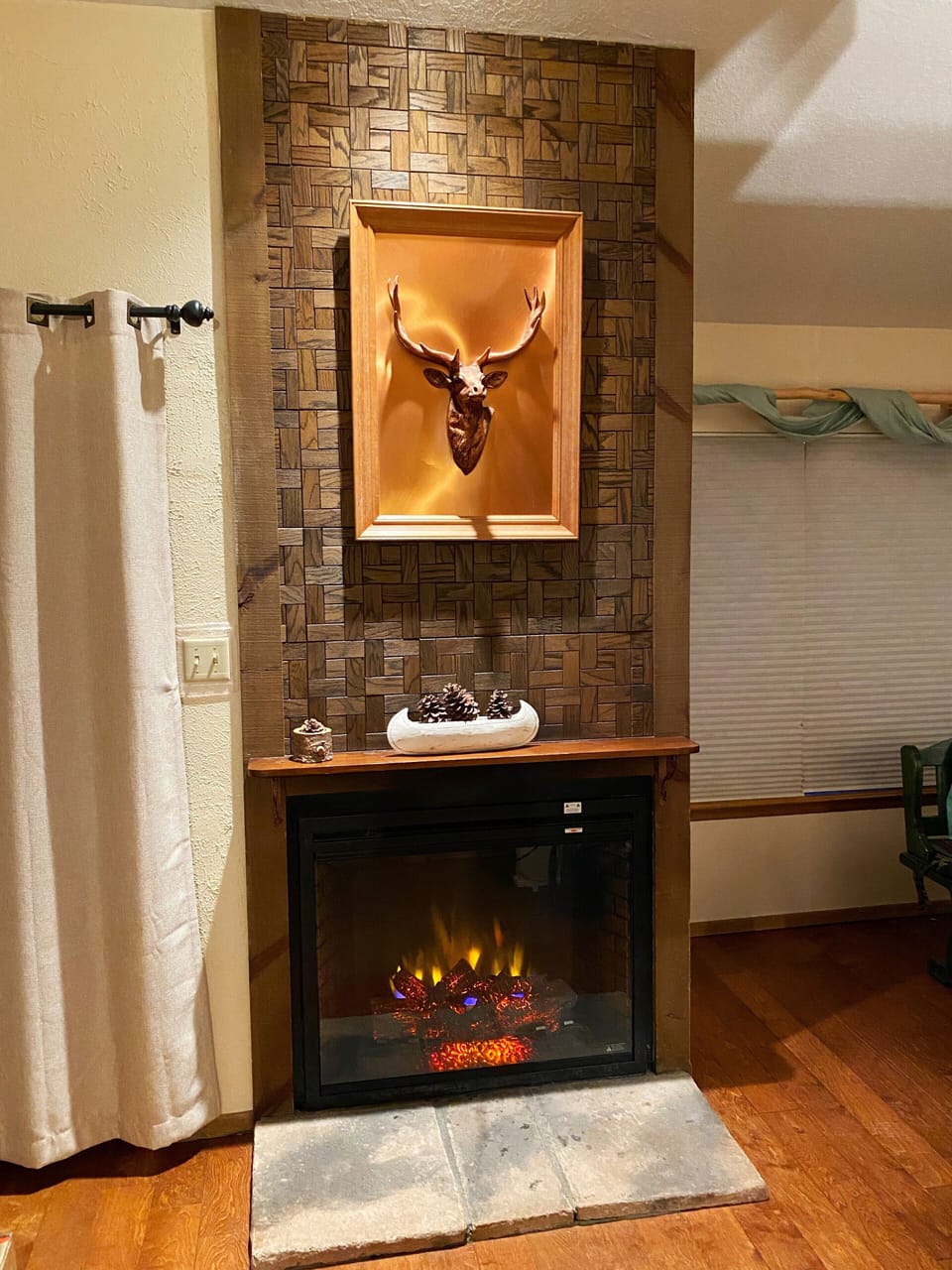 Fireplace turned on providing comforting heat in the winter.