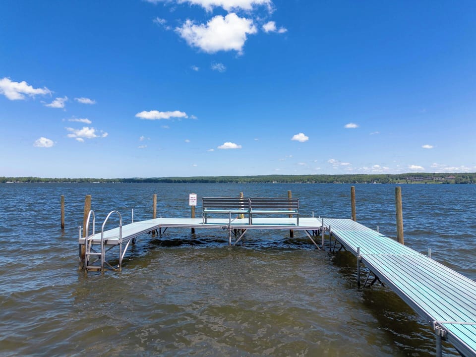 Aluminum dock with benches to enjoy easy access to the water or a relaxing escape from the shore