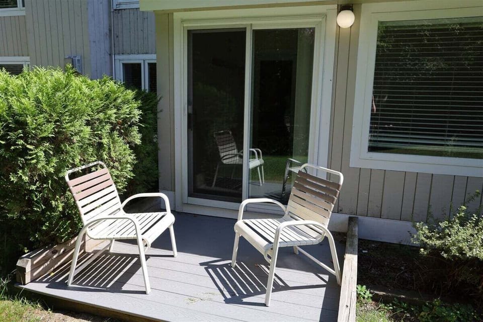 Patio next to Snow Brook at Condo in Waterville Valley