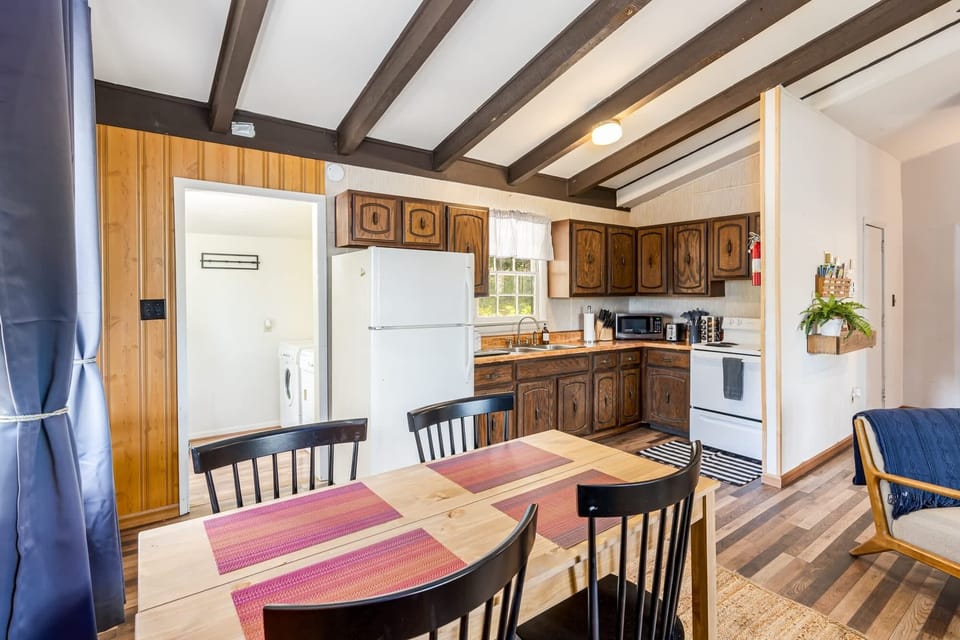 The kitchen adjacent to the dining area