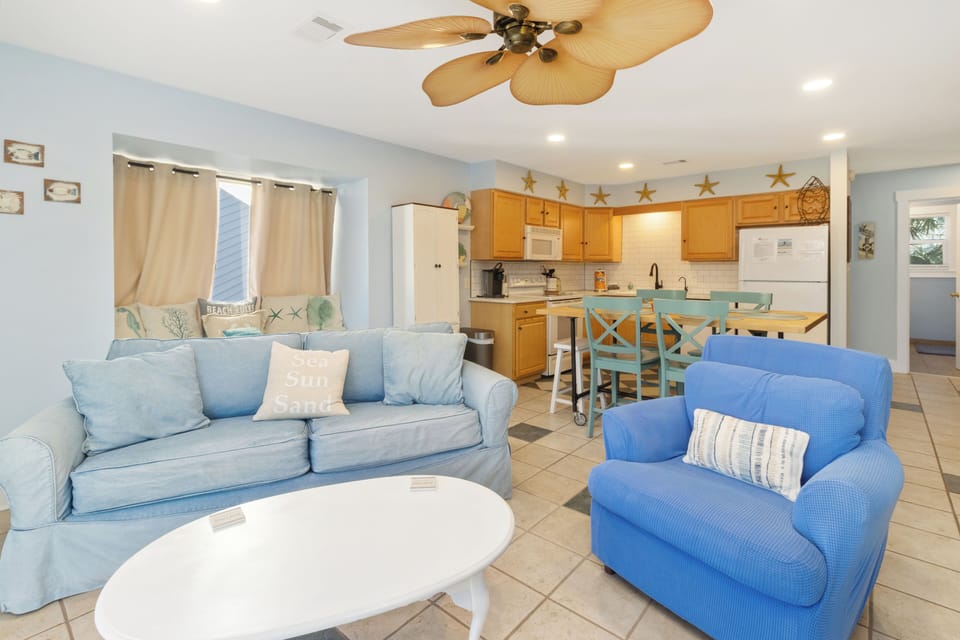 Your open-plan main level keeps the cook connected to the crowd — kitchen and living flow together the way vacation homes should.