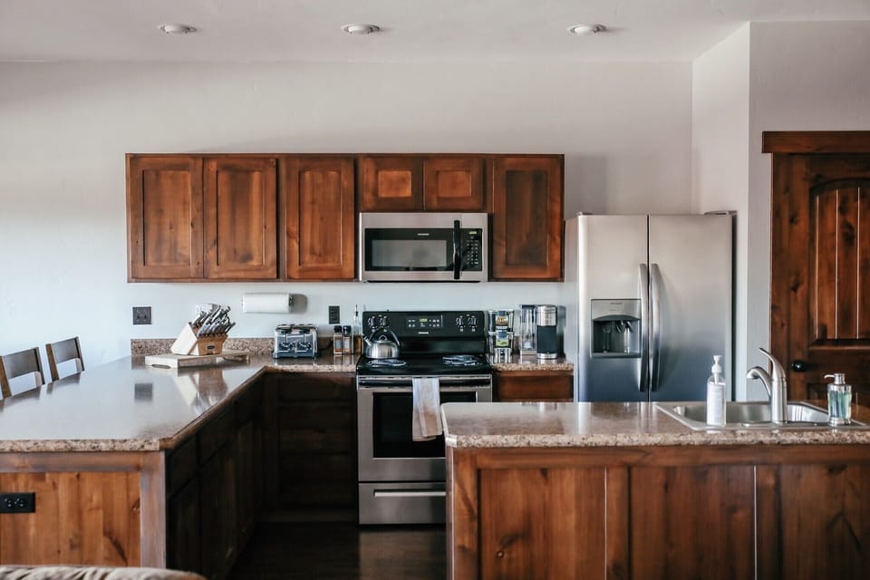 Full kitchen stocked with all cooking essentials.