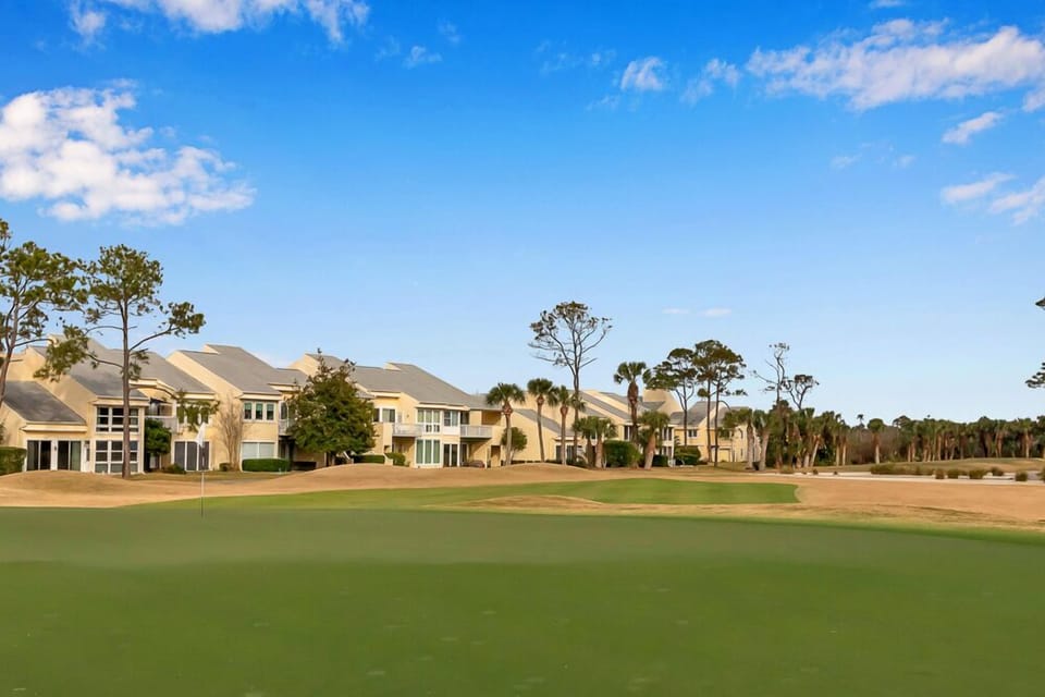 Green fairway views just beyond the backyard, perfect for golf lovers and nature fans.