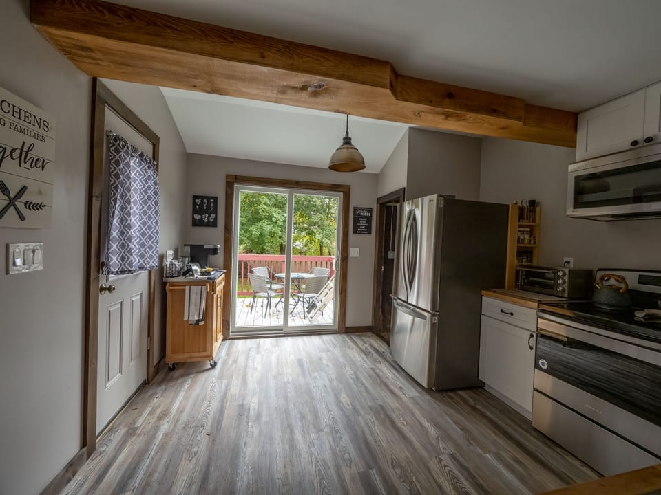 Convenient access to deck through the kitchen sliding glass door