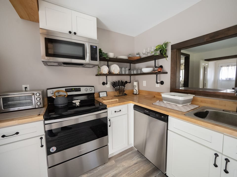Kitchen with appliances and all needed amenities