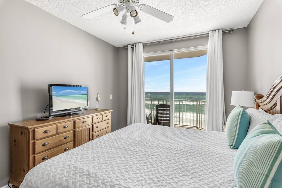 Master bedroom is beautifully decorated and features a King bed, Gulf views, balcony access, Smart TV w/ cable access, private bathroom, and large closet.