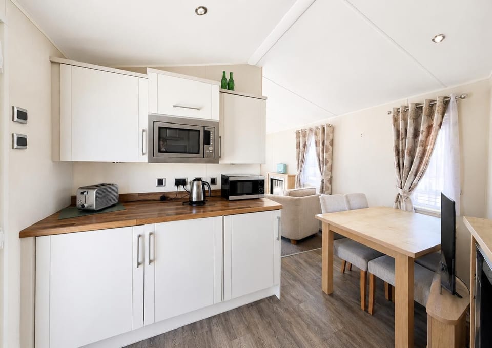 Bright, modern kitchen with ample counter space and natural light