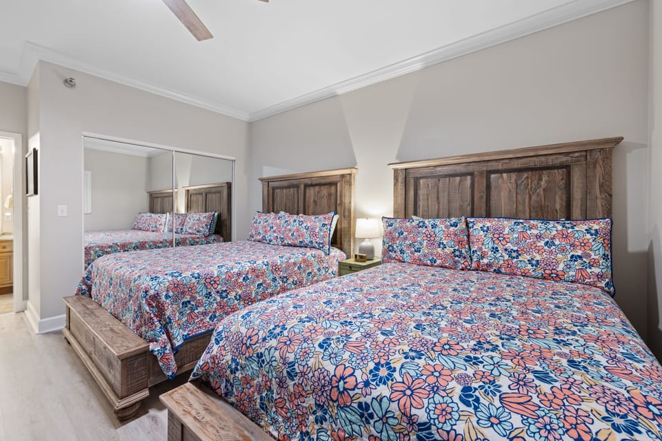 Guest Bedroom with 2 Queen Beds, Smart TV, Couch, and Private Bathroom