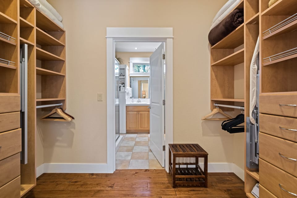 Huge walk in closet, complete with a mirror and ironing board that pull out.