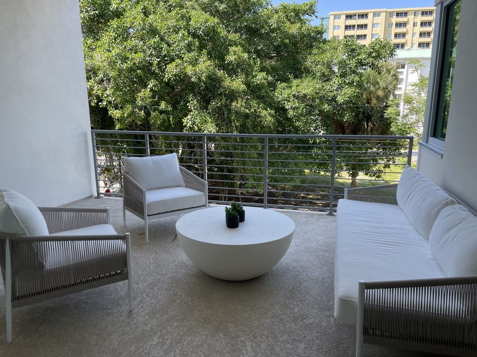 Private balcony with seating for 4