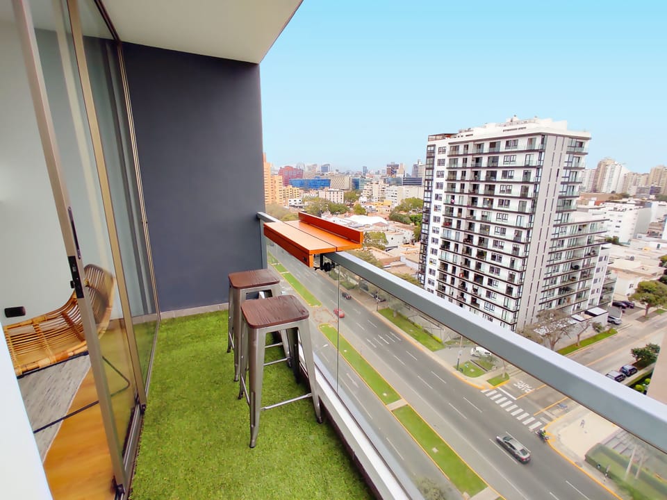 A relaxing balcony with great city views while enjoying a beverage!