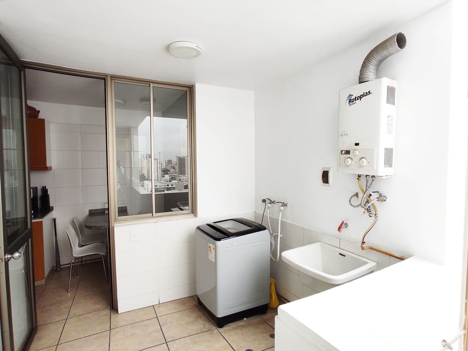 Laundry room with a washer available for you.