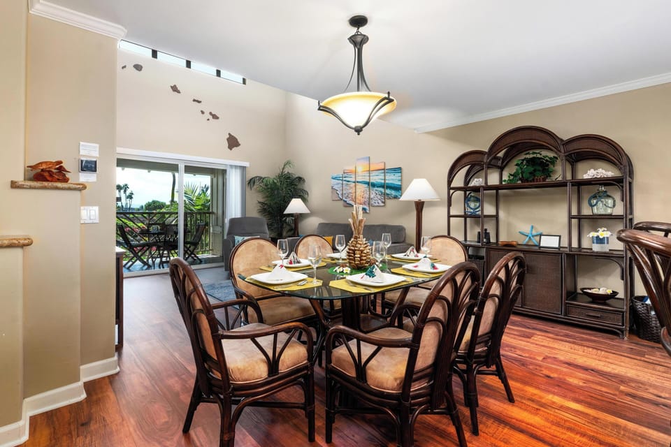Dining area with glass top table and seating for six