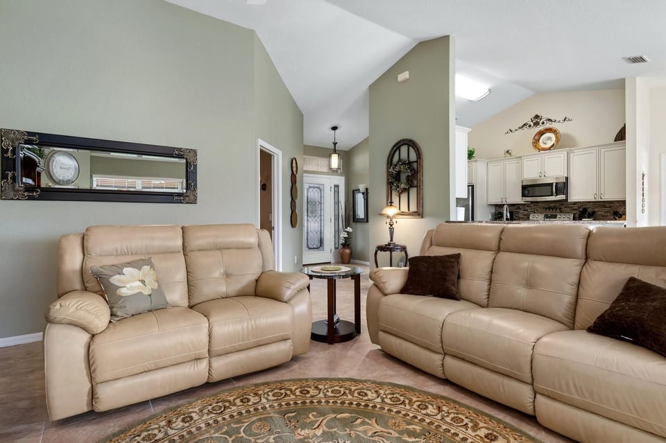 Leather Reclining Sofa and Love seat