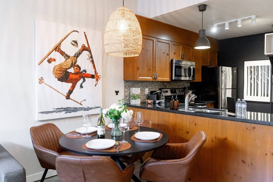Bright and functional kitchen with a cozy dining table—ideal for everything from morning coffee to family meals.