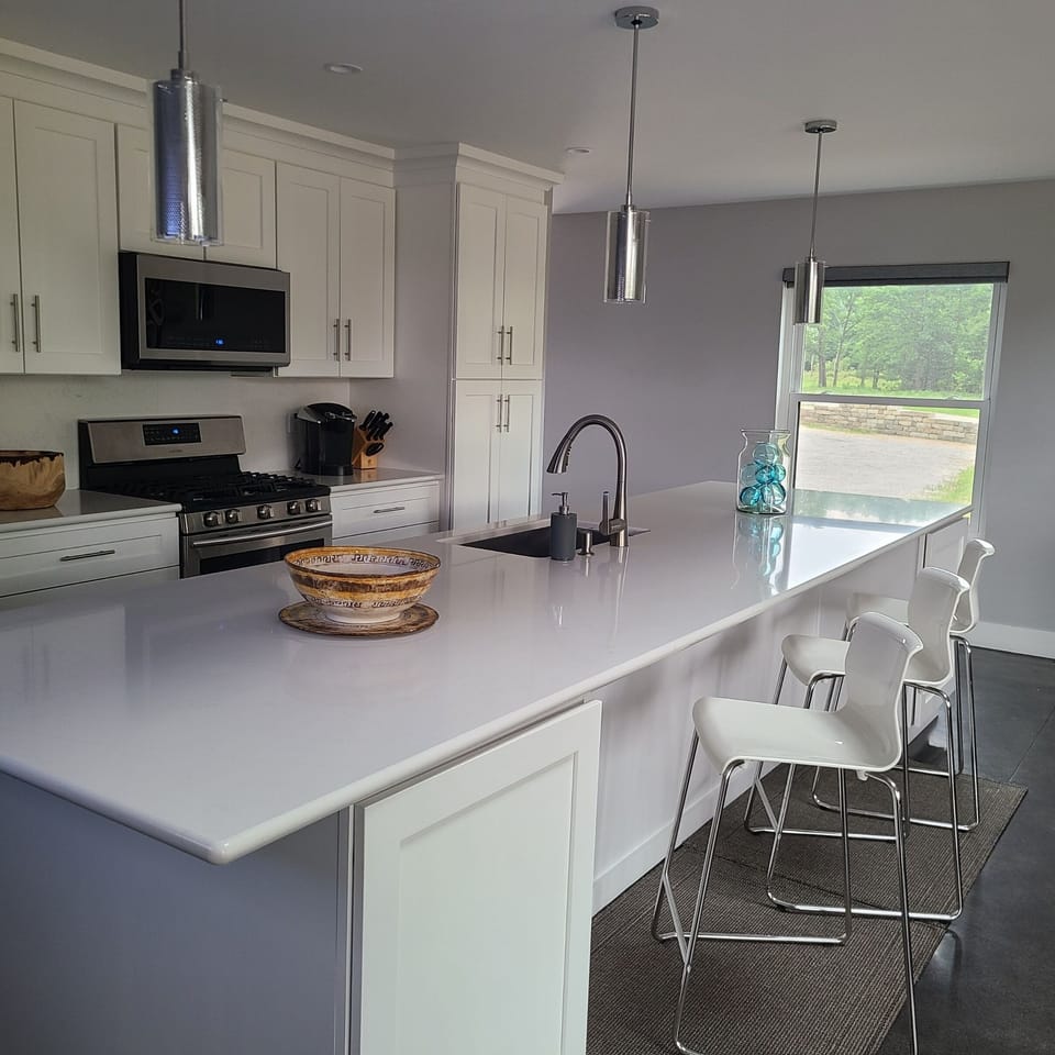 14' island with wine cooler, double pull-out rubbish bins and add'l amenities