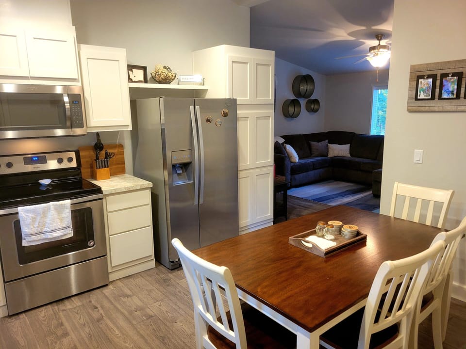 Modern kitchen with all the amenities with seating for 7.