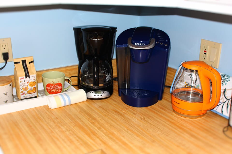 Kitchen comes with utensils, pots, pans, Keurig, tea maker, and so much more