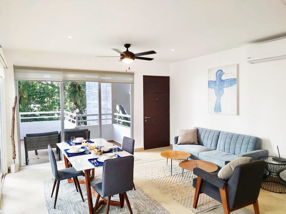 Chic living retreat: plush sofa bed, cool air, ultimate comfort.
