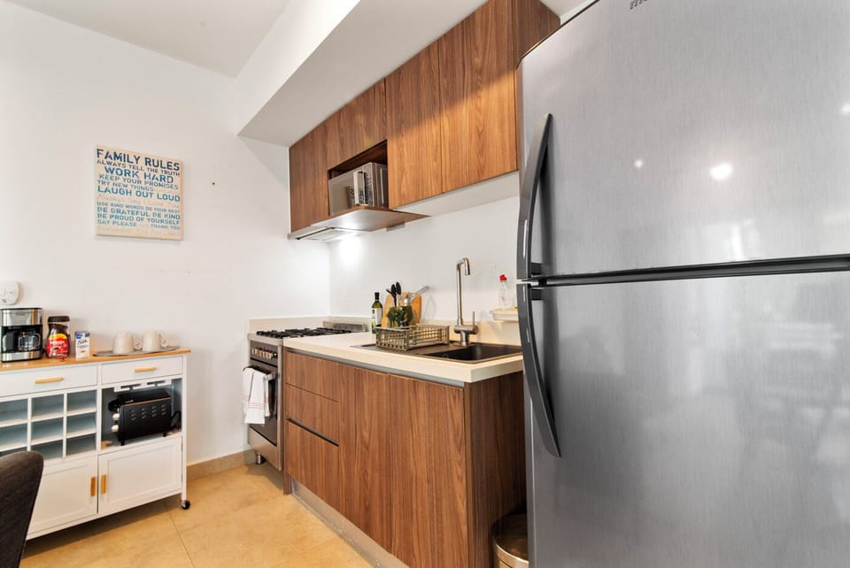 Full kitchen with gas, stove, and coffee station