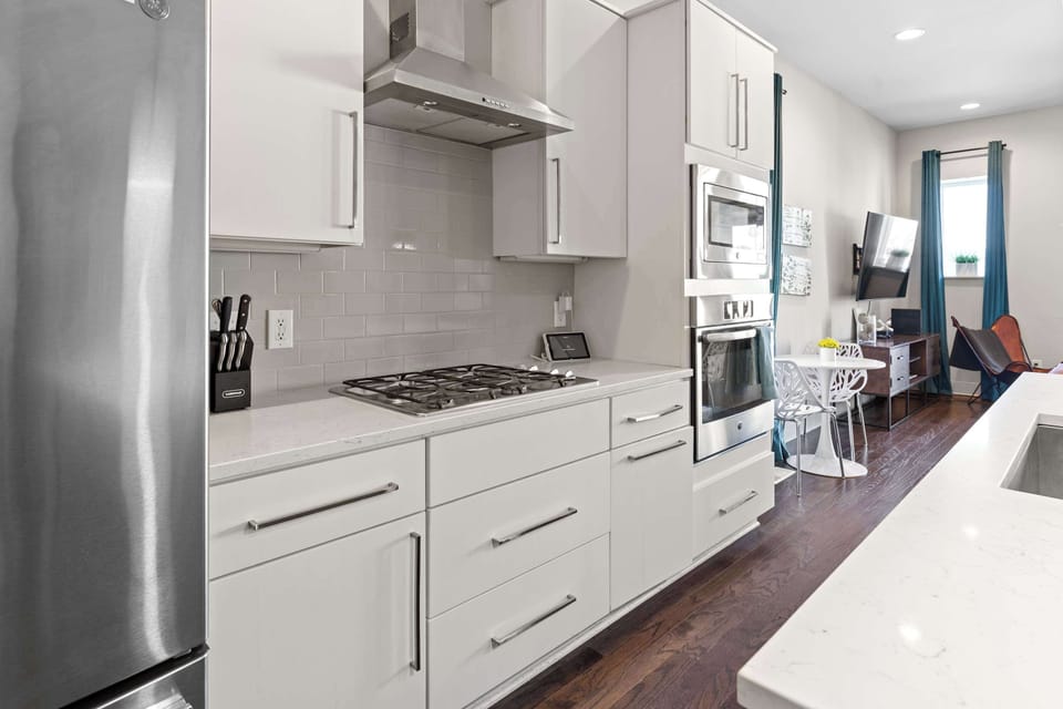 Spacious kitchen with stainless appliances—perfect for meal prep!