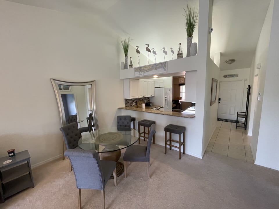 Dining area with new chairs and barstools