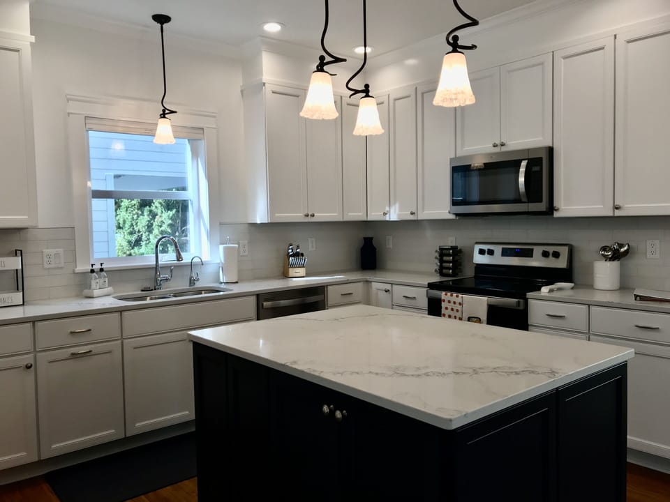 kitchen with quartz countertops and stainless steel appliances
