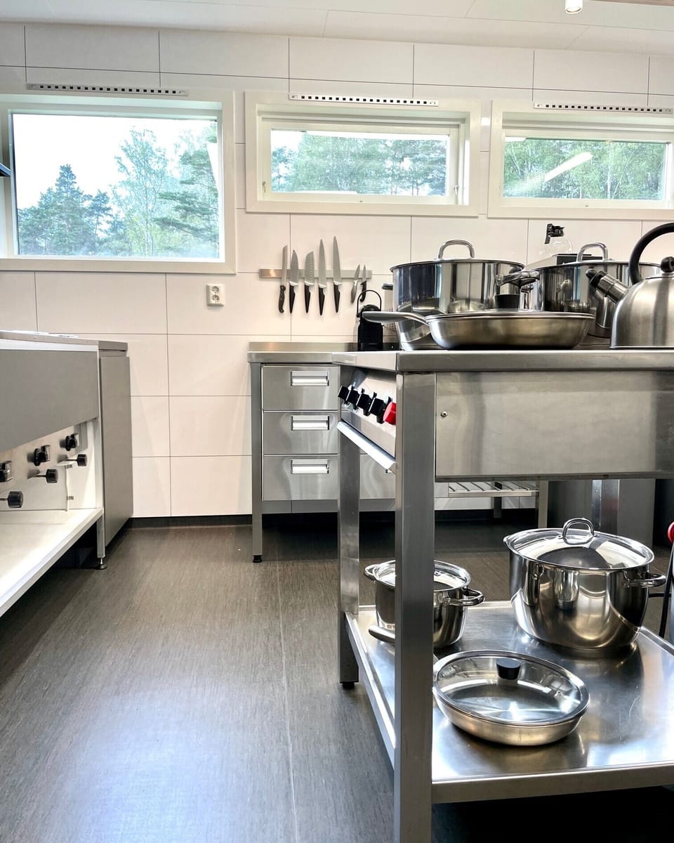 Commercial kitchen is equipped with everything you need for meal preparation