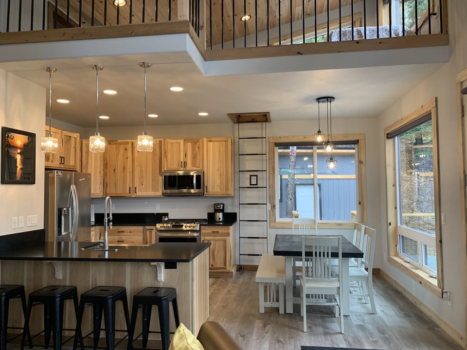 Chefs kitchen and view of loft