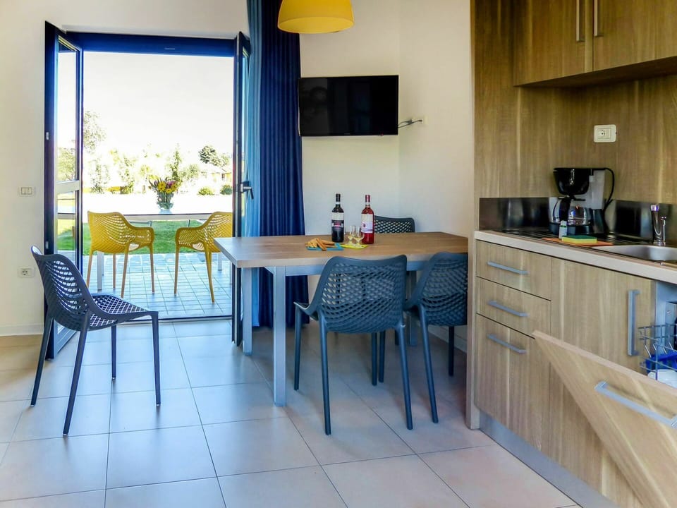 Furniture, Table, Plant, Cabinetry, Blue, Window, Countertop, Wood, Curtain, Lighting