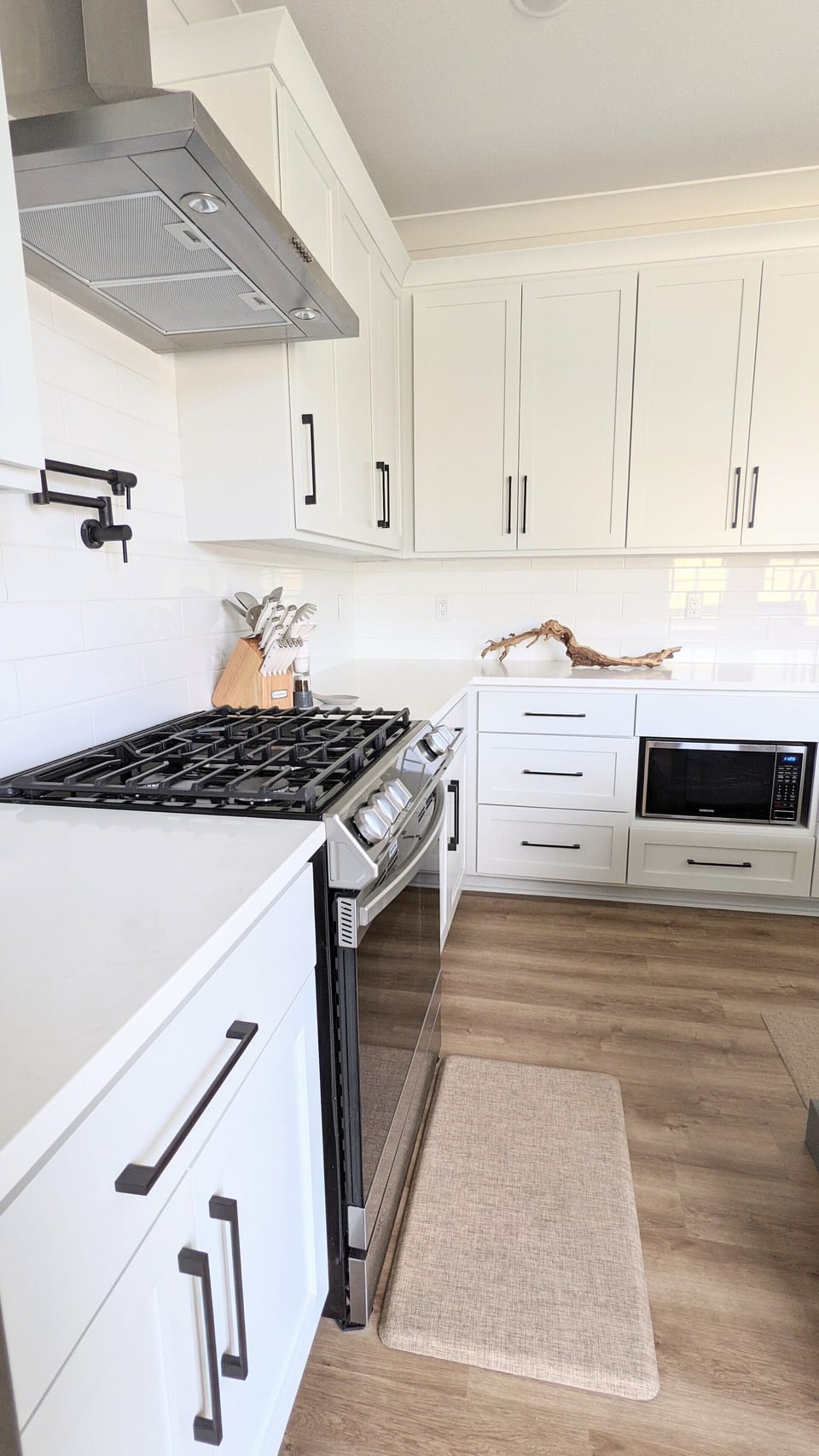 Gas range with built in microwave.