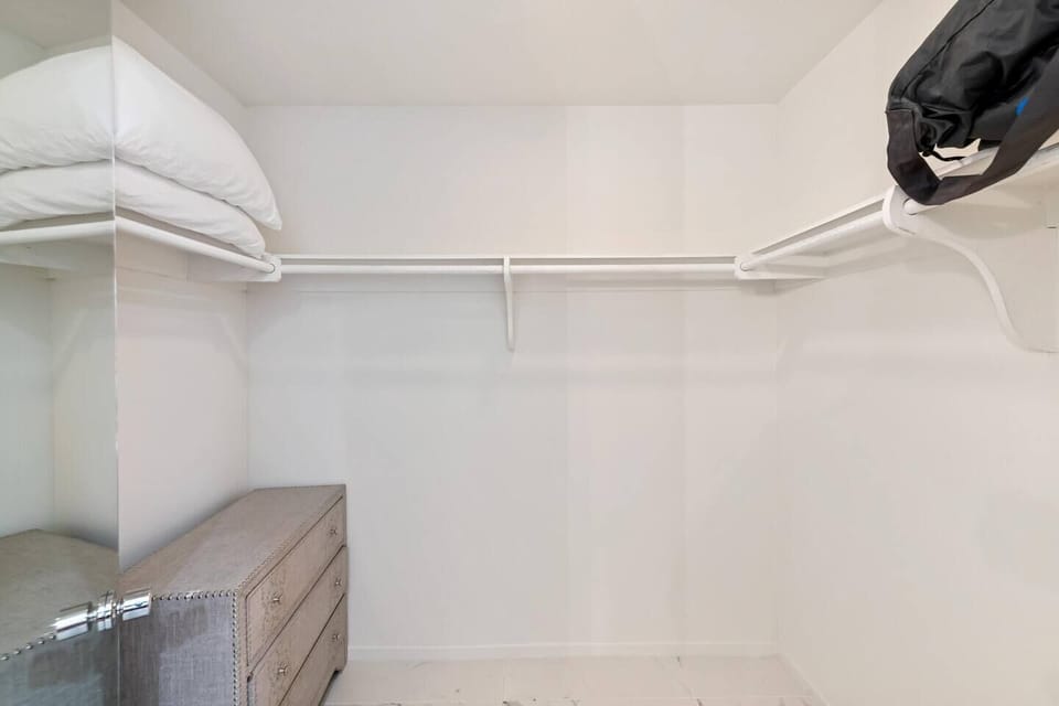 Both bedrooms have large walk in closets and their own bathrooms. 