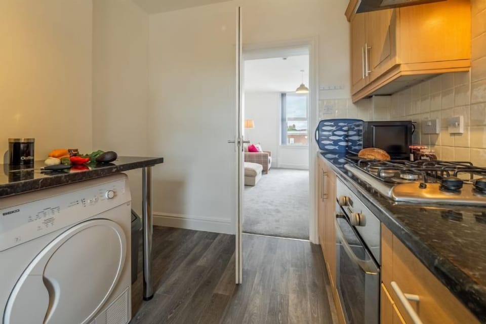 First floor: Kitchen leading into the dining room