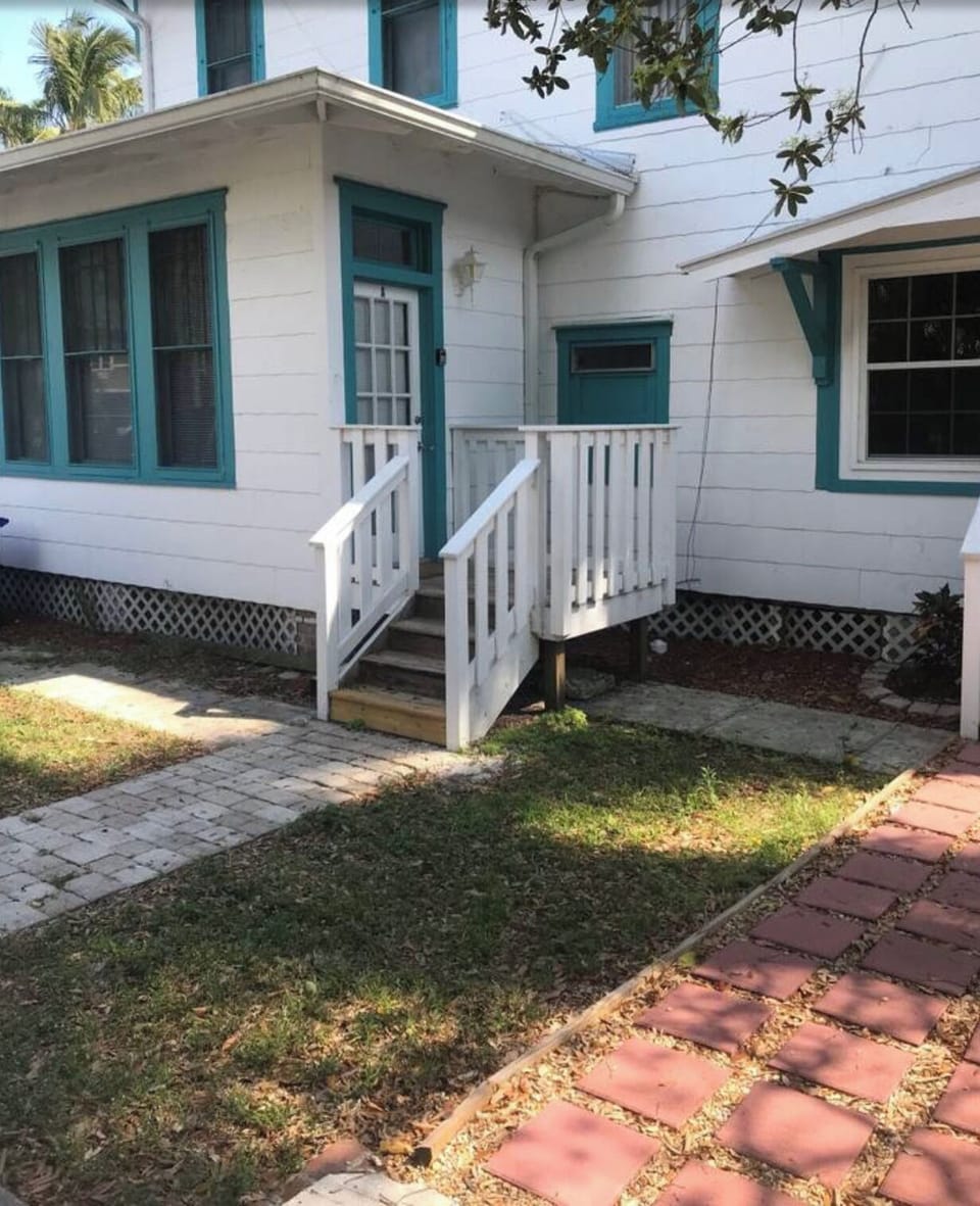 Studio front entrance with steps to the small front porch