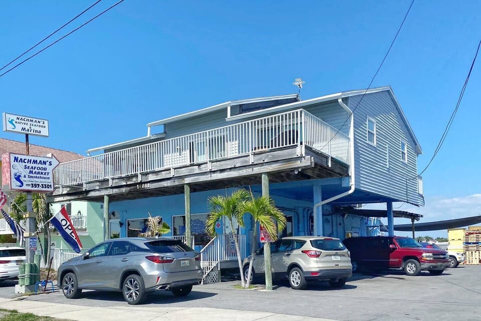 The famous Nachmans seafood market and smokehouse is 1/2 mile North