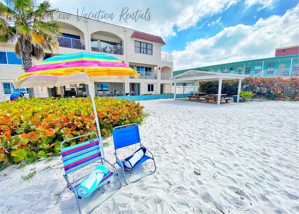 Beach chairs and umbrella provided