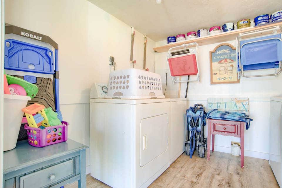 Laundry is located downstairs outside. Collapsible beach wagons provided!