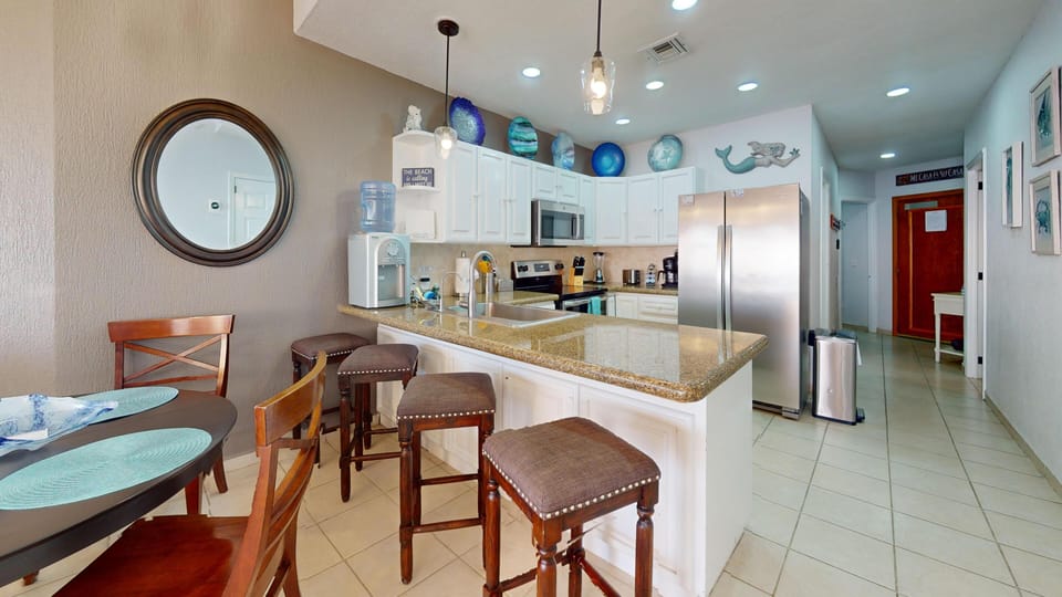 There is  2.5 purified water dispenser-refills available at the front desk.