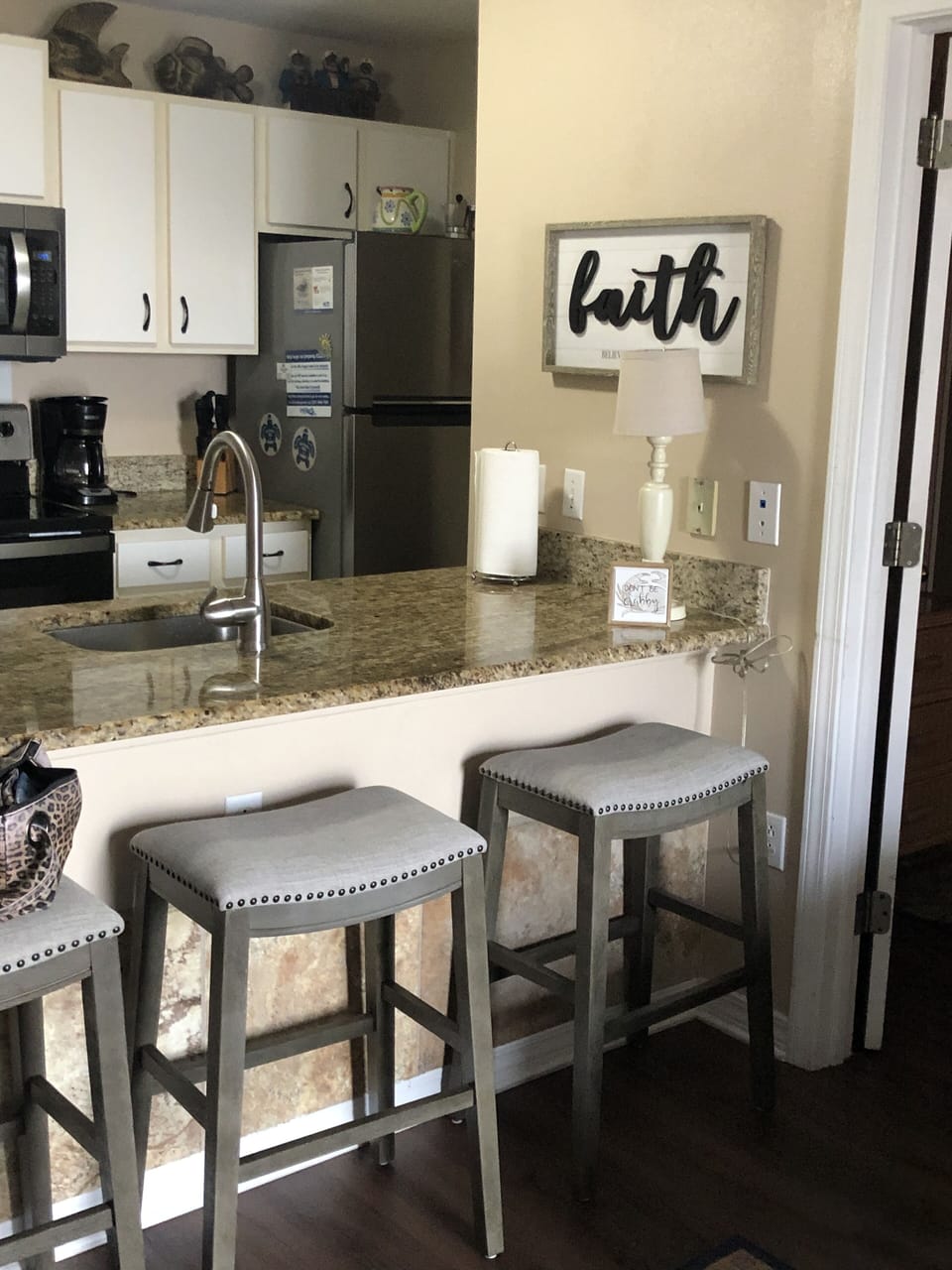 All new stainless appliances, four bar stools
