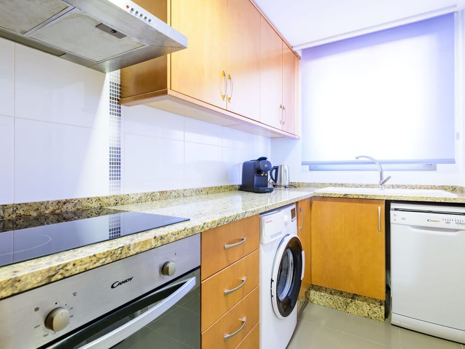 Cabinetry, Countertop, Property, Kitchen Stove, Kitchen, Wood, Kitchen Appliance, Building, Interior Design, Kitchen Sink