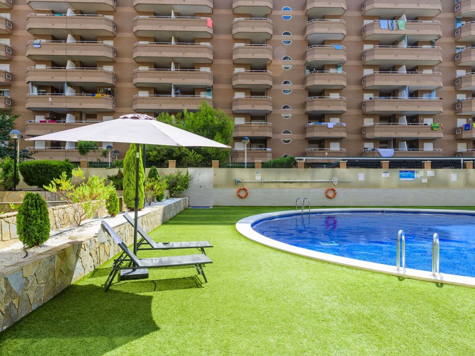 Plant, Building, Water, Property, Window, Swimming Pool, Shade, Tree, Outdoor Furniture, Urban Design