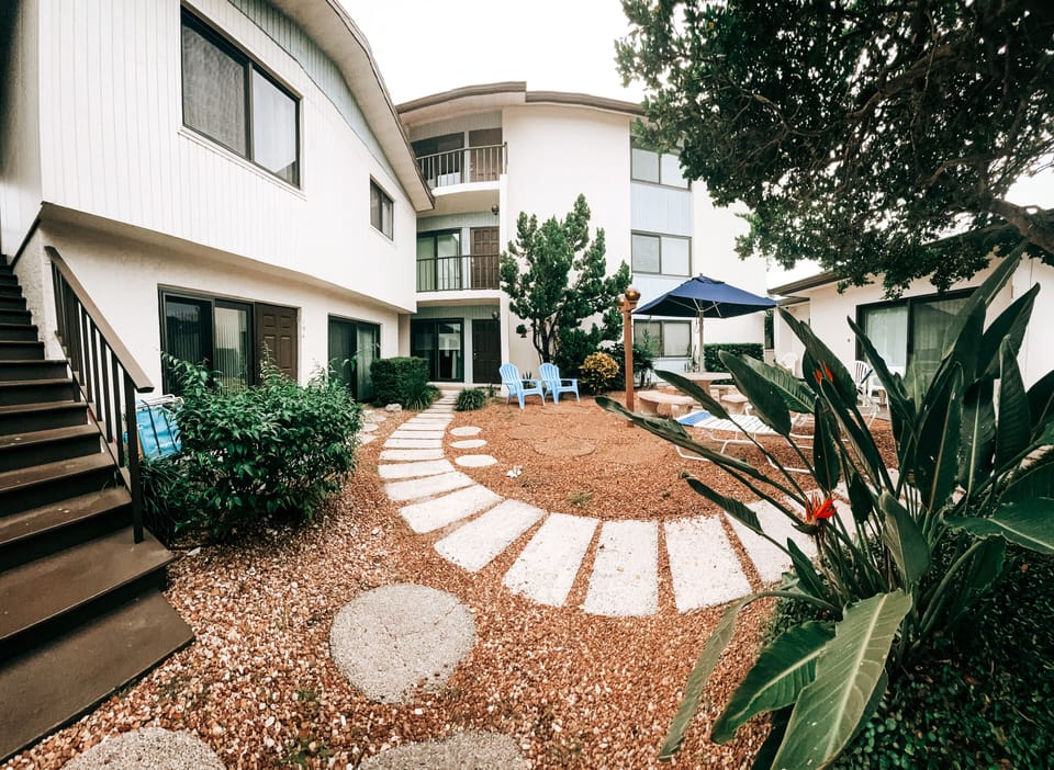 Overlooks courtyard. View designated parking spot for small to midsize vehicle