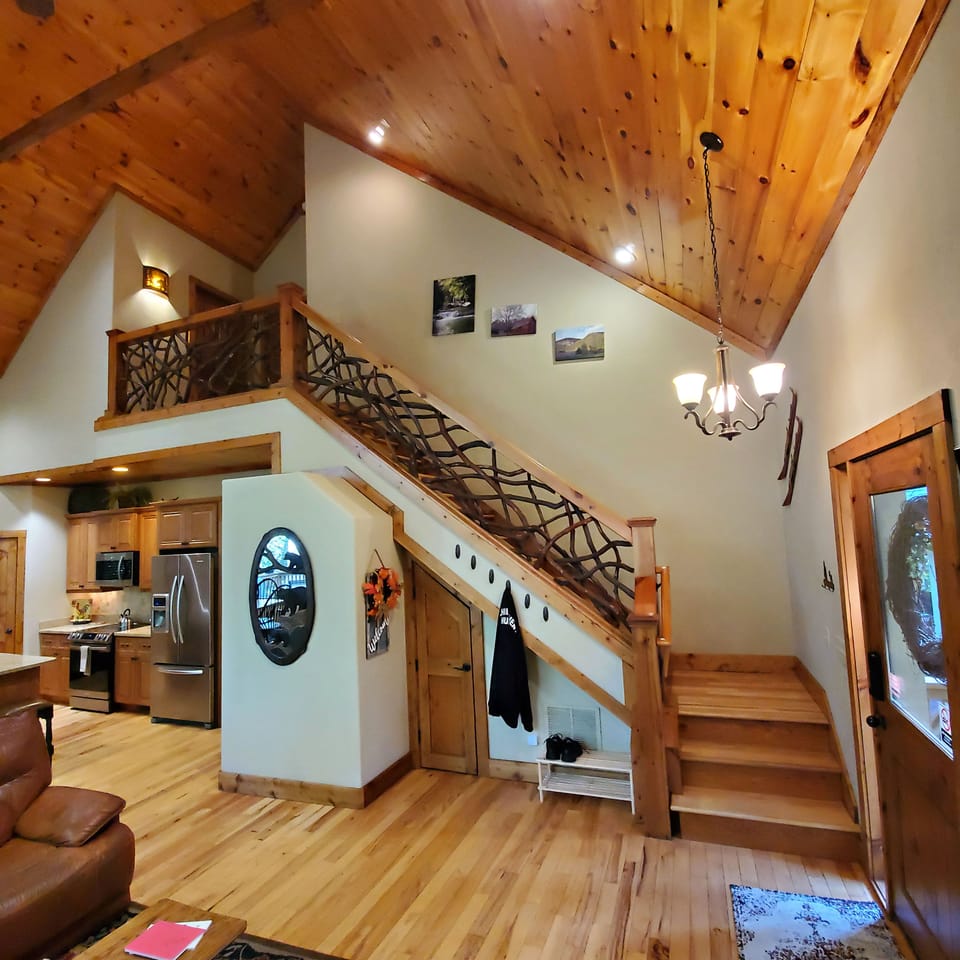 Laurel Tree staircase leads to 2nd story landing. (2) bedrooms (1) bath upstairs
