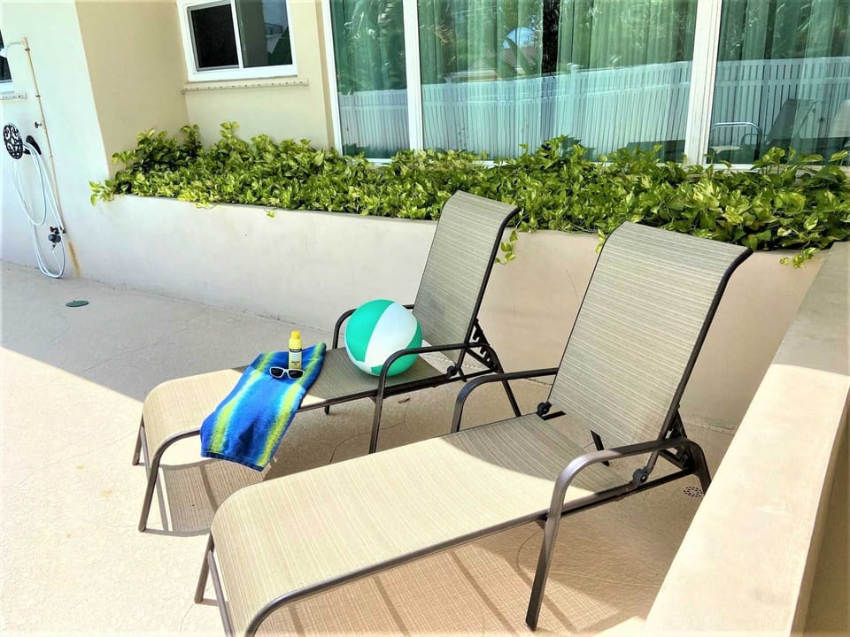 Work on your tan on one of the chaises.