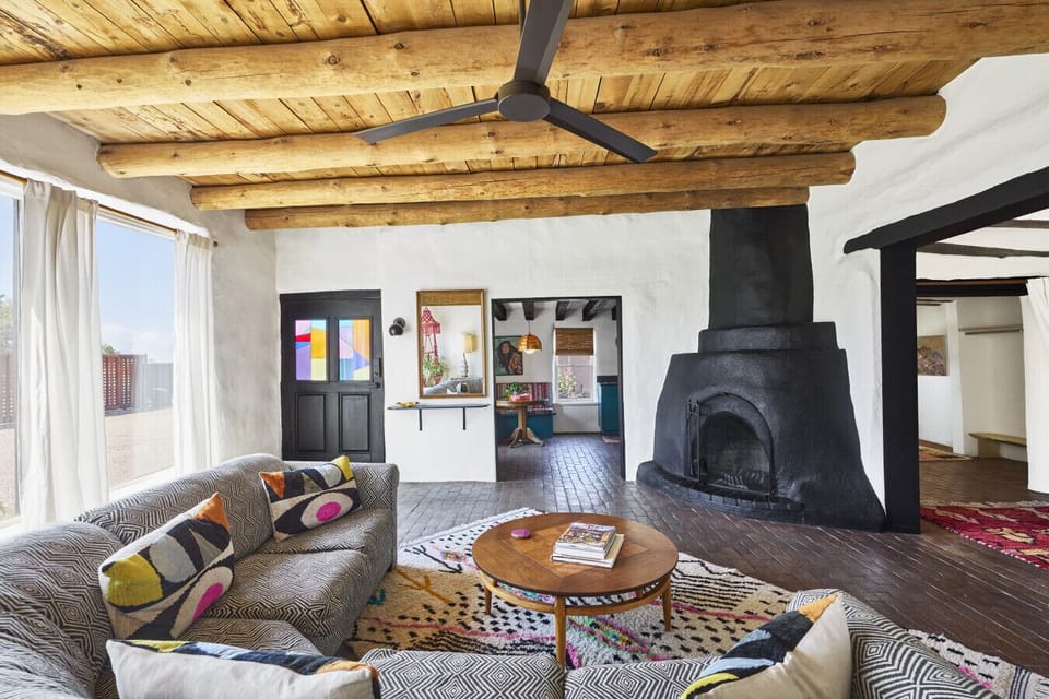 1000+ sq ft with full kitchen, full bath, 2bds, private patio, and wood-burning fireplace