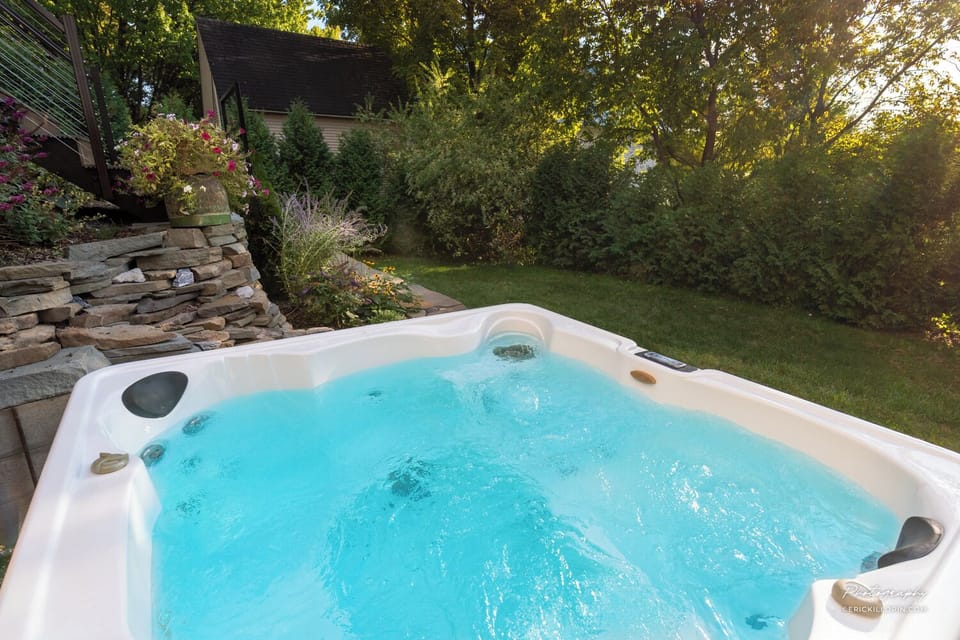 4-6 person hot tub with private backyard setting