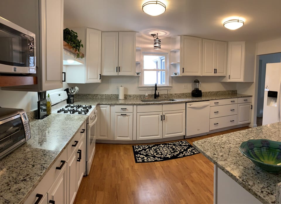 Kitchen stocked w/Calphalon stainless cookware and all the tools!