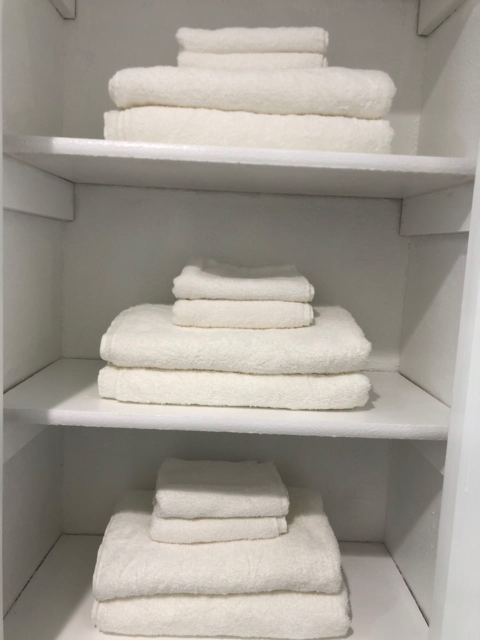 Fresh and clean towels at main bathroom and bathroom in master bedroom. 